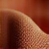Close up of high-quality fabric texture, showing detail and weave.